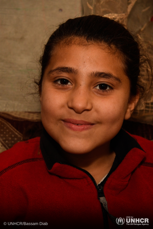 Nine-year-old Amal, originally from Hama, is internally displaced with her family in Aleppo.